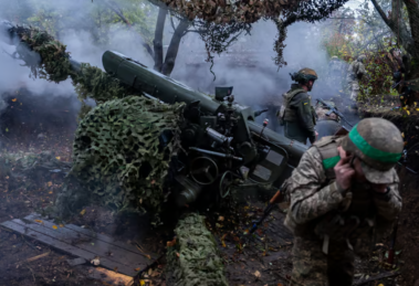 Ukrainian servicemen of Khartia brigade fire D-30 Howitzer towards Russian positions in Kharkiv region, Ukraine, Wednesday, Oct. 16, 2024. Photo: Alex Babenko/AP